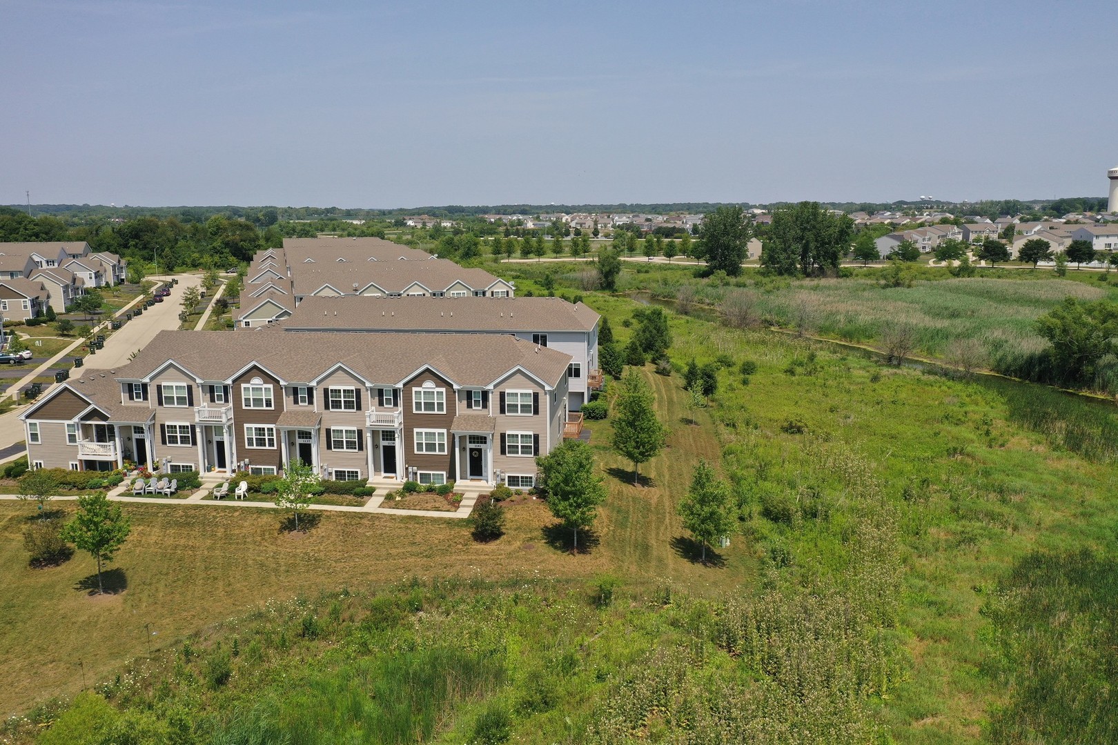 1141 Piccolo Lane Volo, IL 60073 - Photo 24 of 29 an aerial view of a house with a garden and a yard