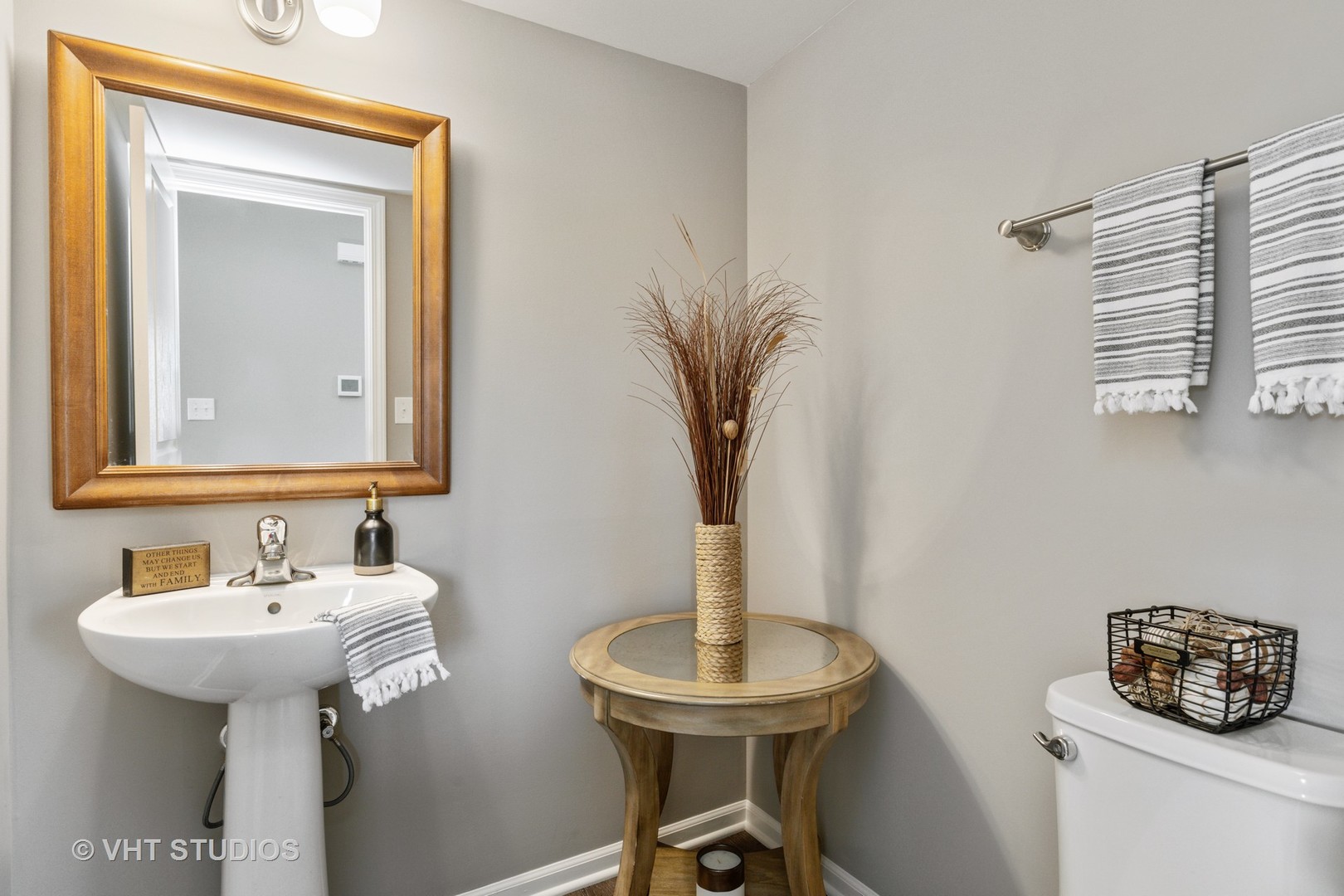 1141 Piccolo Lane Volo, IL 60073 - Photo 10 of 29 a bathroom with a sink a mirror and a toilet