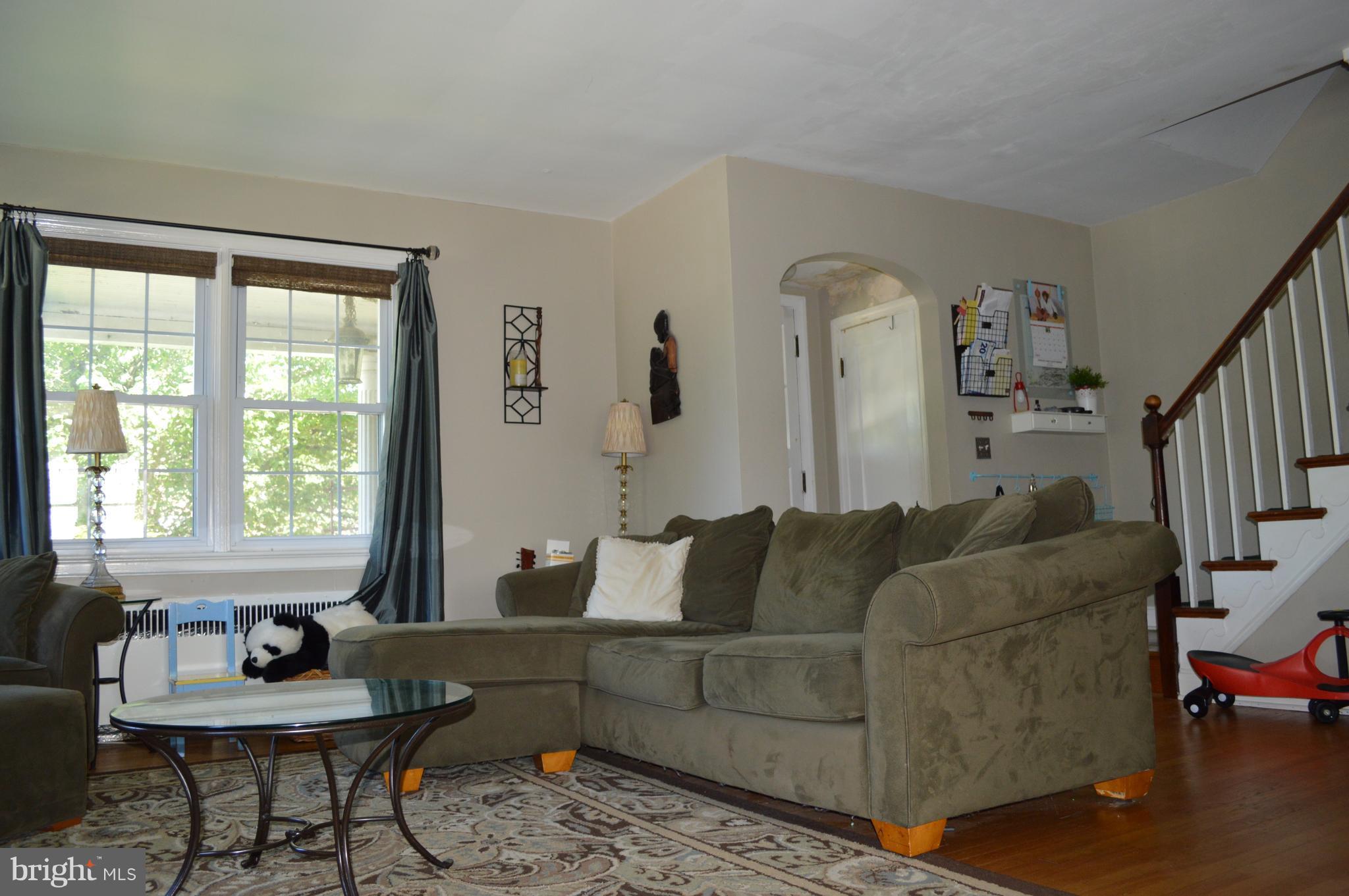 3722 Delverne Road Baltimore, MD 21218 - Photo 6 of 29 a living room with furniture and a large window