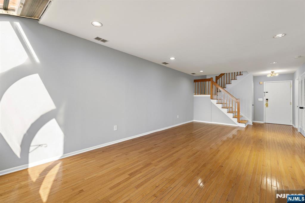 319 Gorge Road, Unit 6 Cliffside Park, NJ 07010 - Photo 6 of 24 a view of empty room with wooden floor