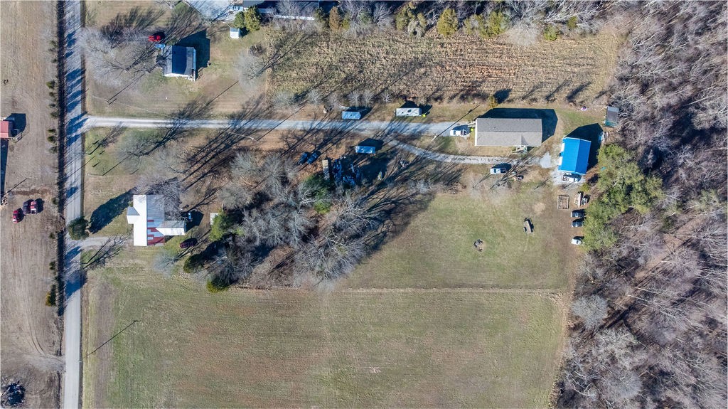 7560 Old Madisonville Road Hopkinsville, KY 42240 - Photo 12 of 31 a view of a house with a yard