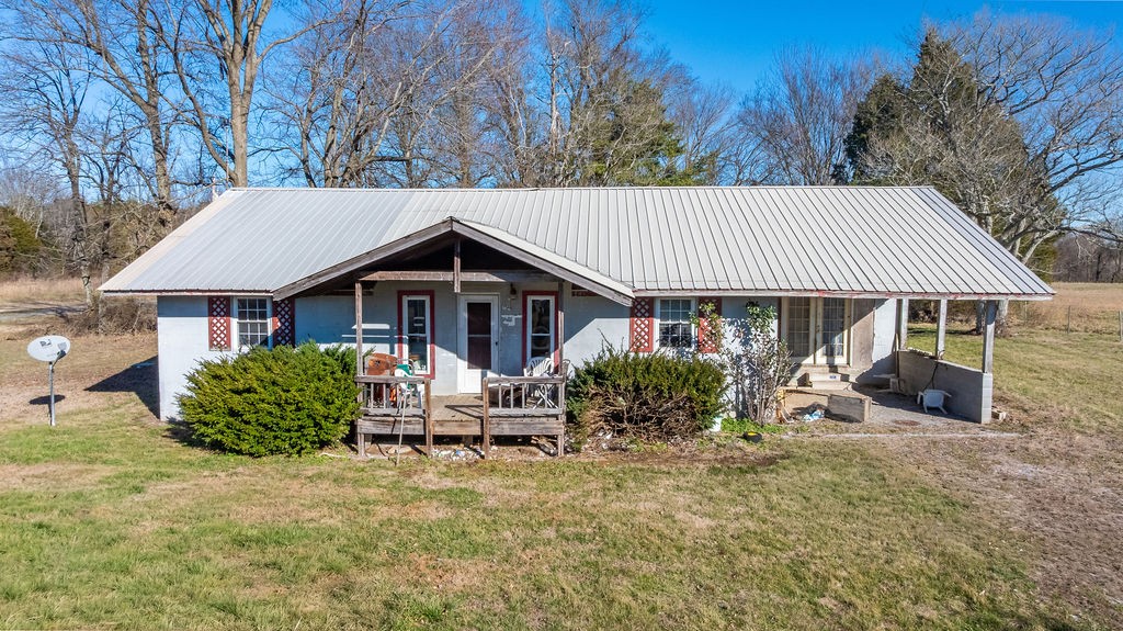 7560 Old Madisonville Road Hopkinsville, KY 42240 - Photo 2 of 31 a view of house with a yard