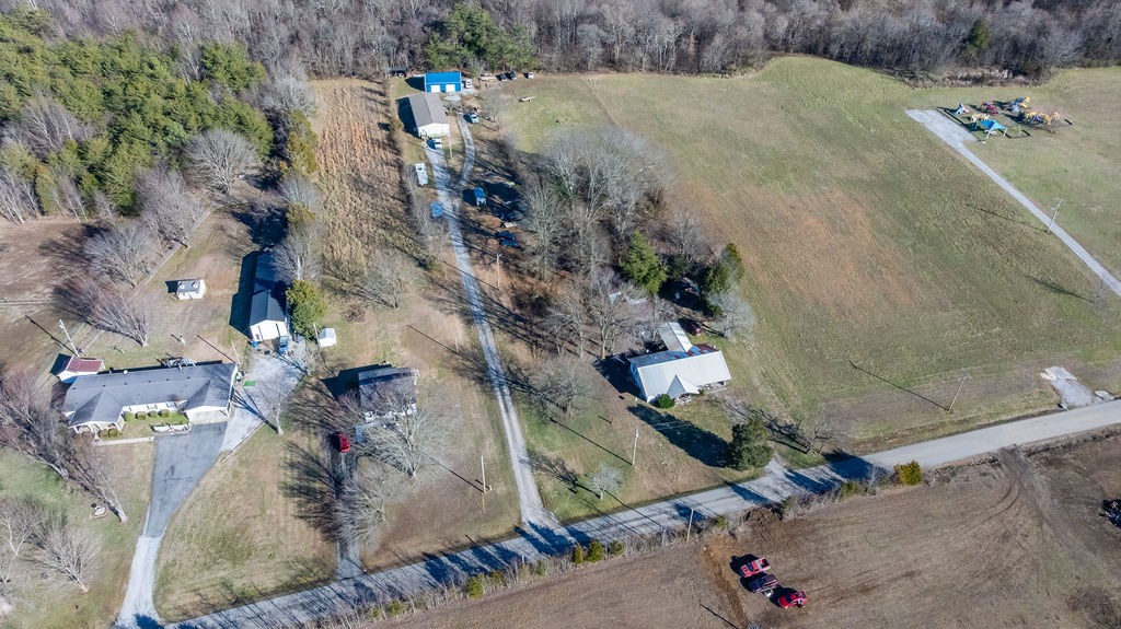 7560 Old Madisonville Road Hopkinsville, KY 42240 - Photo 10 of 31 an aerial view of a house with a yard