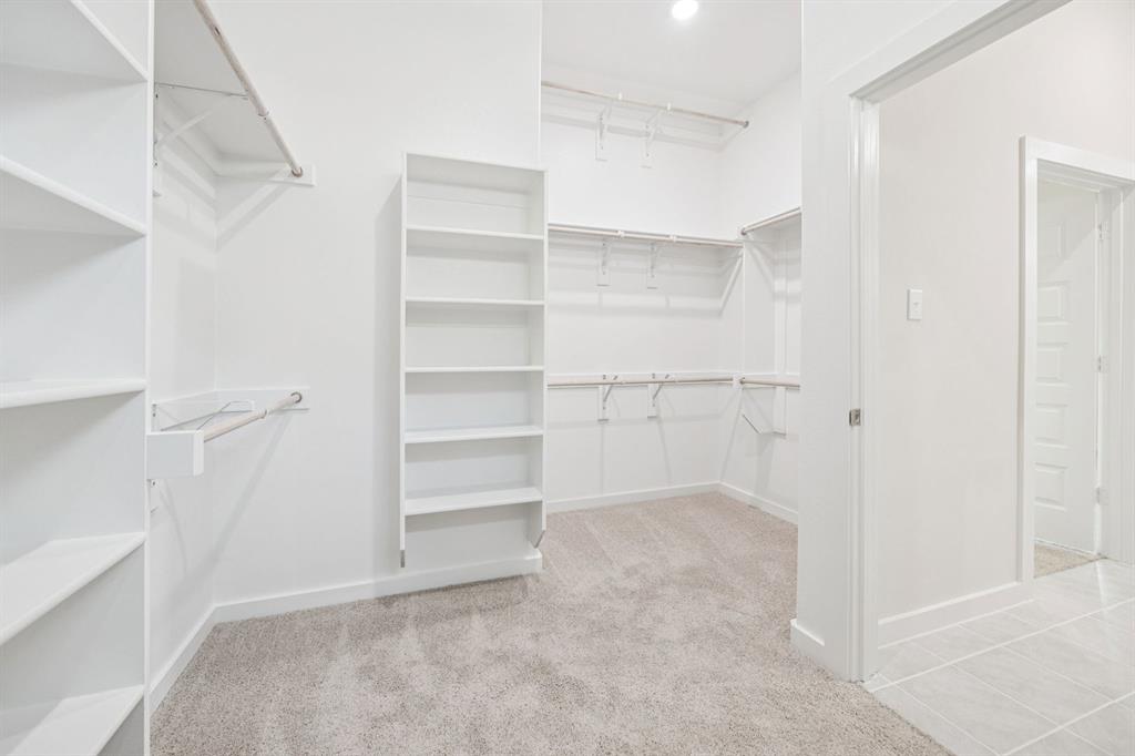 749 Lyft Lane Aledo, TX 76008 - Photo 18 of 29 Primary Closet in the Claret home plan by Trophy Signature Homes – REPRESENTATIVE PHOTO