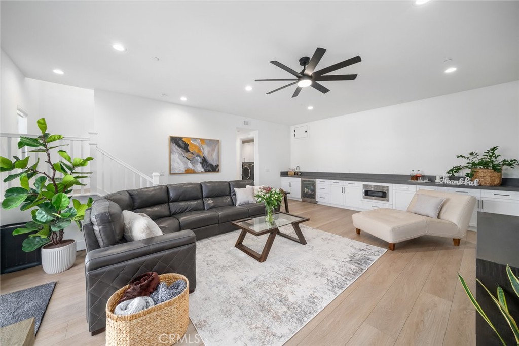4019 Hillside Drive San Luis Obispo, CA 93401 - Photo 17 of 32 a living room with furniture and a potted plant