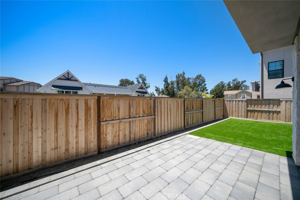 4019 Hillside Drive San Luis Obispo, CA 93401 - Photo 21 of 32 a view of a backyard with wooden fence