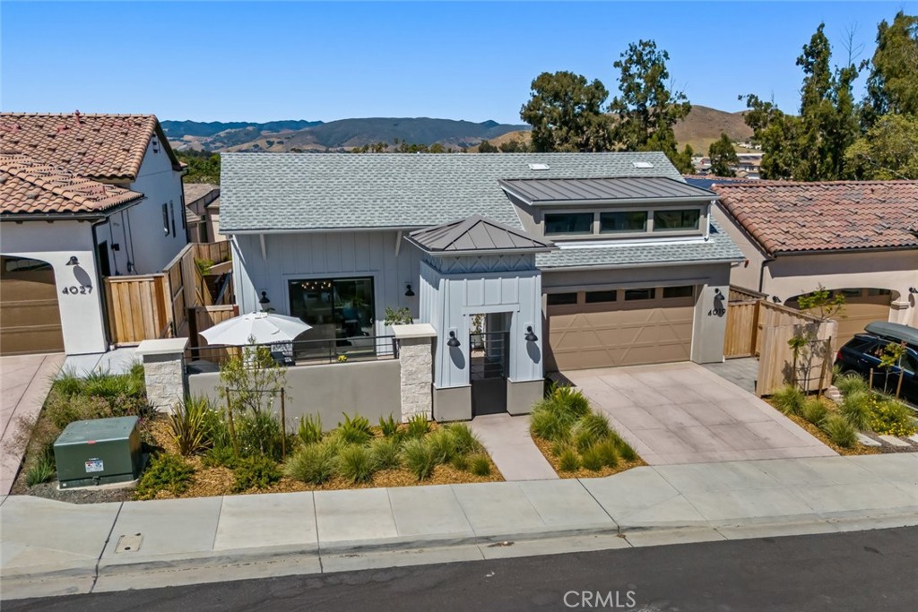 4019 Hillside Drive San Luis Obispo, CA 93401 - Photo 30 of 32 a front view of a house with garden