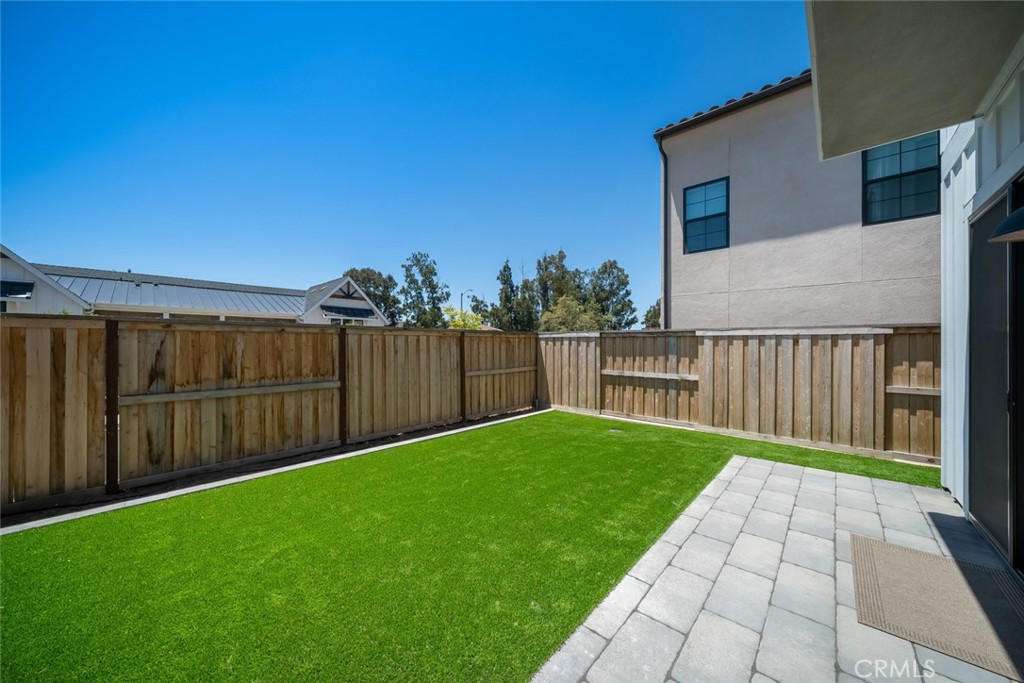 4019 Hillside Drive San Luis Obispo, CA 93401 - Photo 4 of 32 a view of a backyard with wooden fence