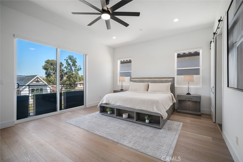 4019 Hillside Drive San Luis Obispo, CA 93401 - Photo 5 of 32 a spacious bedroom with a bed and a walk in closet