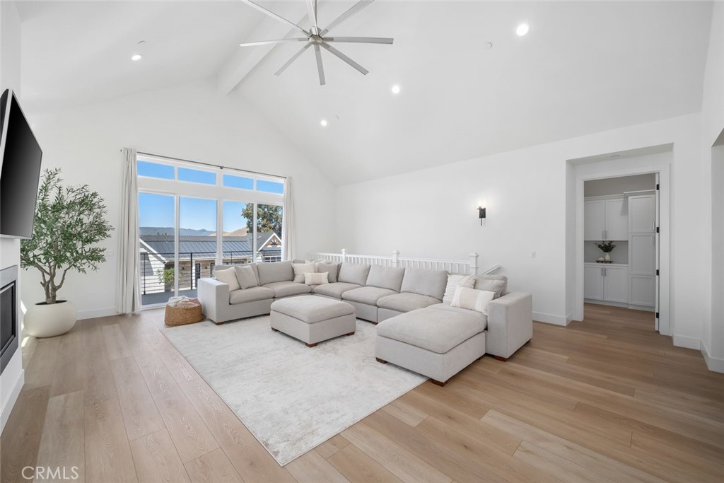 4019 Hillside Drive San Luis Obispo, CA 93401 - Photo 7 of 32 a living room with furniture and a flat screen tv