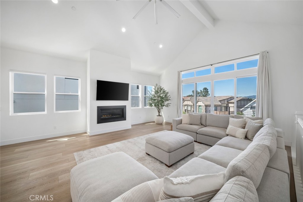 4019 Hillside Drive San Luis Obispo, CA 93401 - Photo 8 of 32 a living room with furniture and a flat screen tv