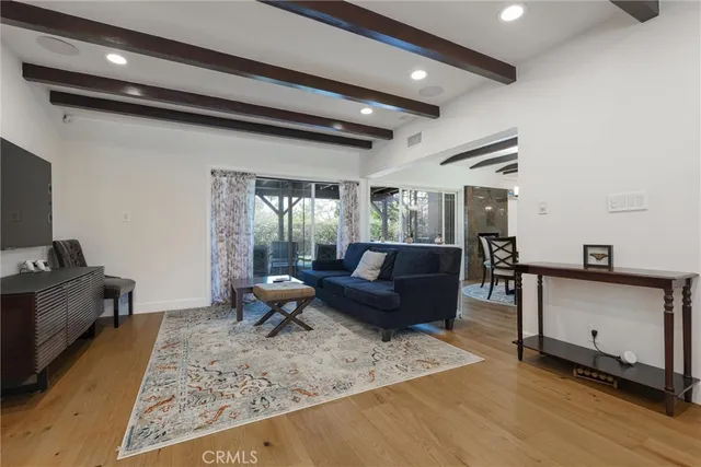 a view of a workspace with furniture and a livingroom