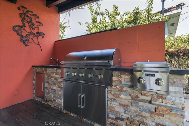 a view of a backyard with large trees