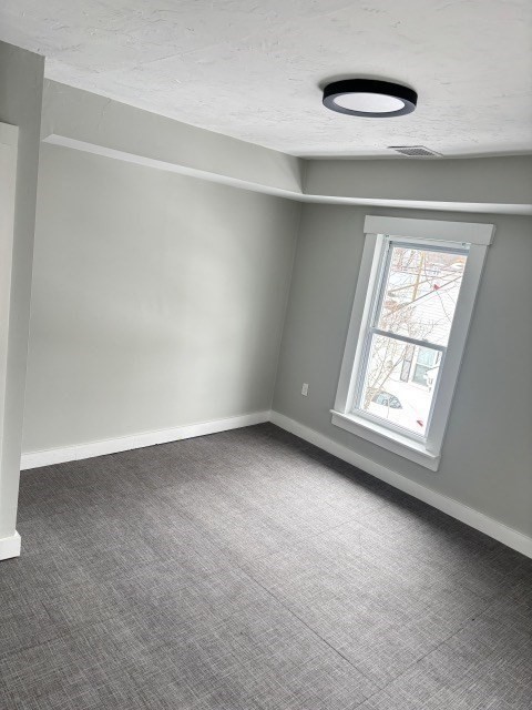 60 Silver Lake Street Athol, MA 01331 - Photo 18 of 36 an empty room with a window
