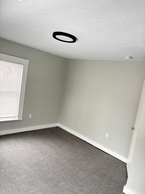 60 Silver Lake Street Athol, MA 01331 - Photo 24 of 37 an empty room with a workbench