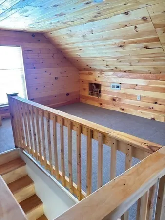 a view of a balcony with stairs
