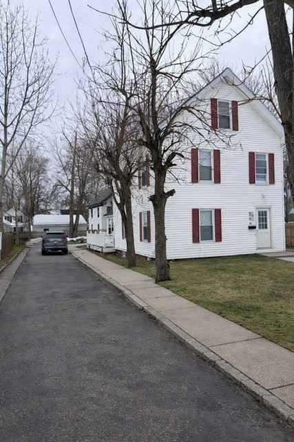 60 Silver Lake Street Athol, MA 01331 - Photo 35 of 36 a view of a white house next to a road and yard