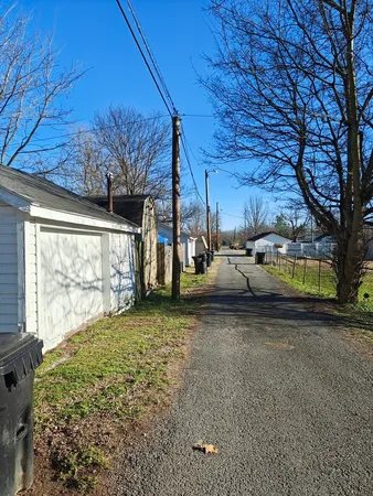 a view of a backyard of the house