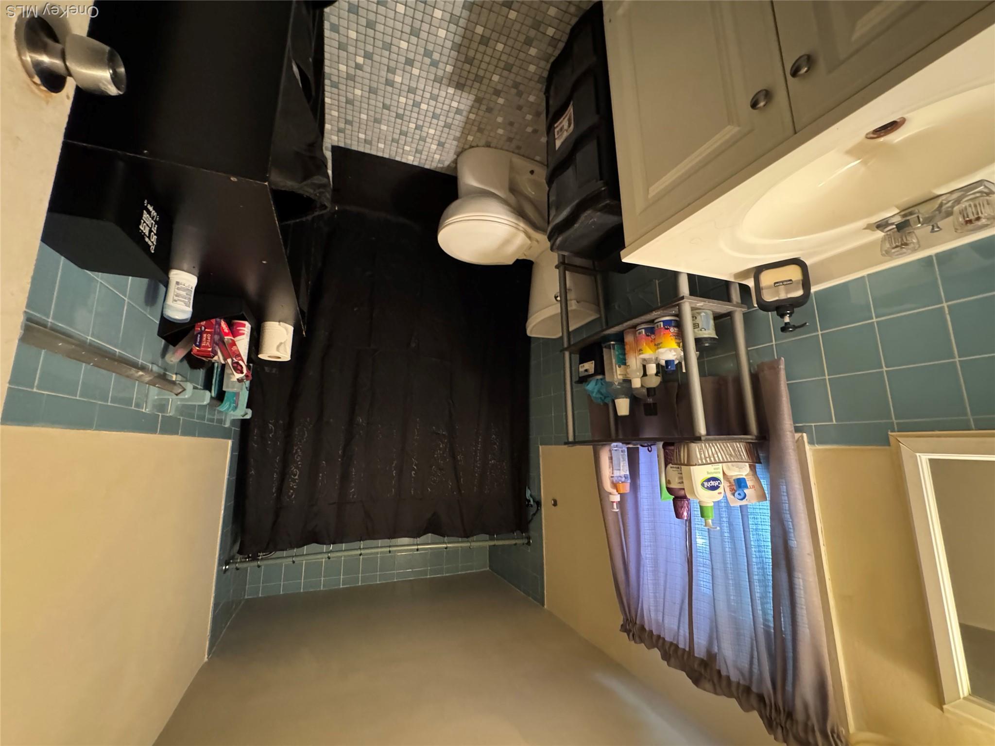 9 Armstrong Avenue Peekskill, NY 10566 - Photo 11 of 16 a bathroom with a sink toilet and shower