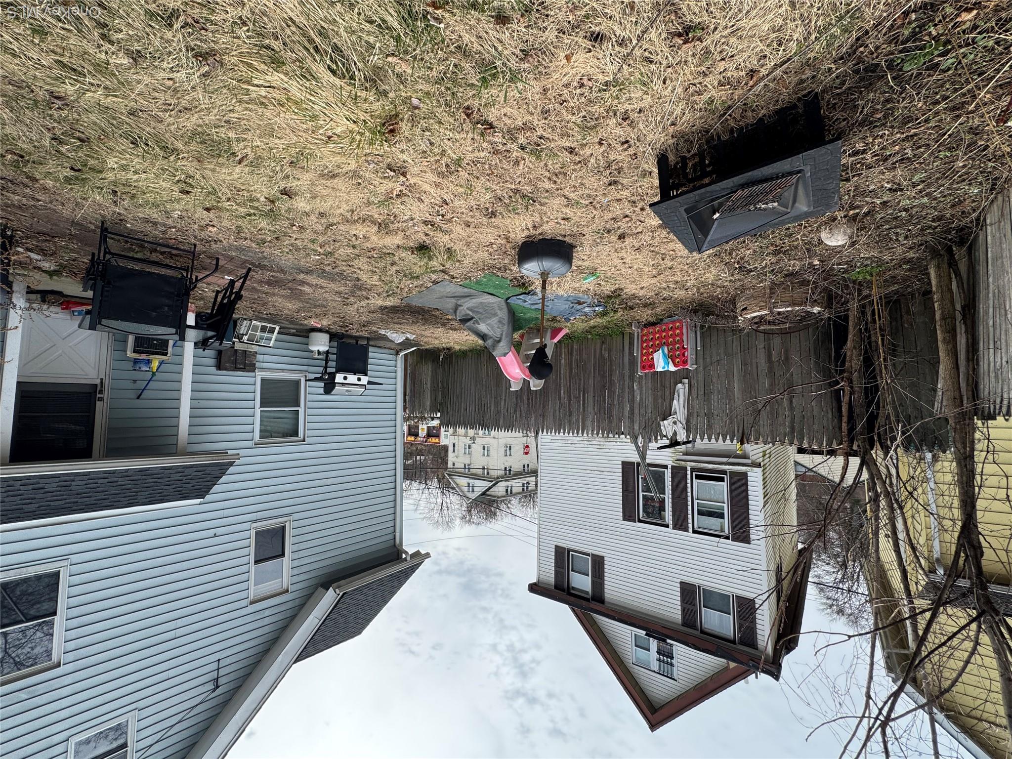 9 Armstrong Avenue Peekskill, NY 10566 - Photo 15 of 16 a backyard of a house with barbeque oven table and chairs