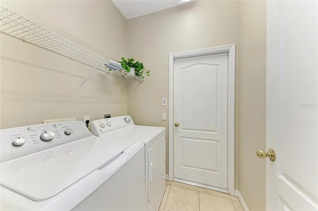 an aerial view of a city with lots of residential buildings