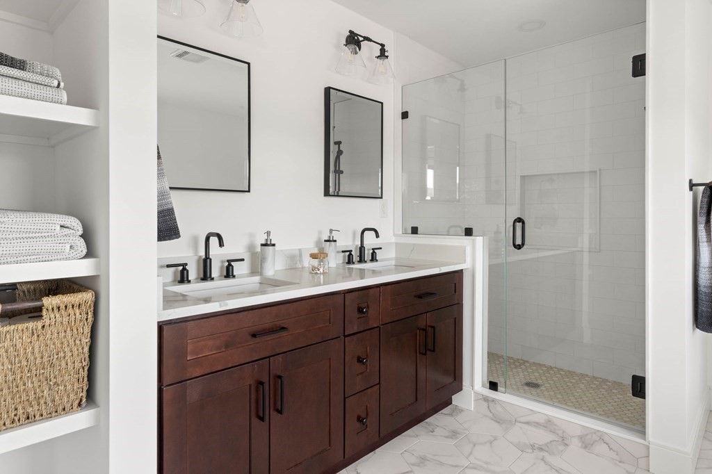 6 Woodman Road Amesbury, MA 01913 - Photo 24 of 37 a spacious bathroom with double sink and a mirror