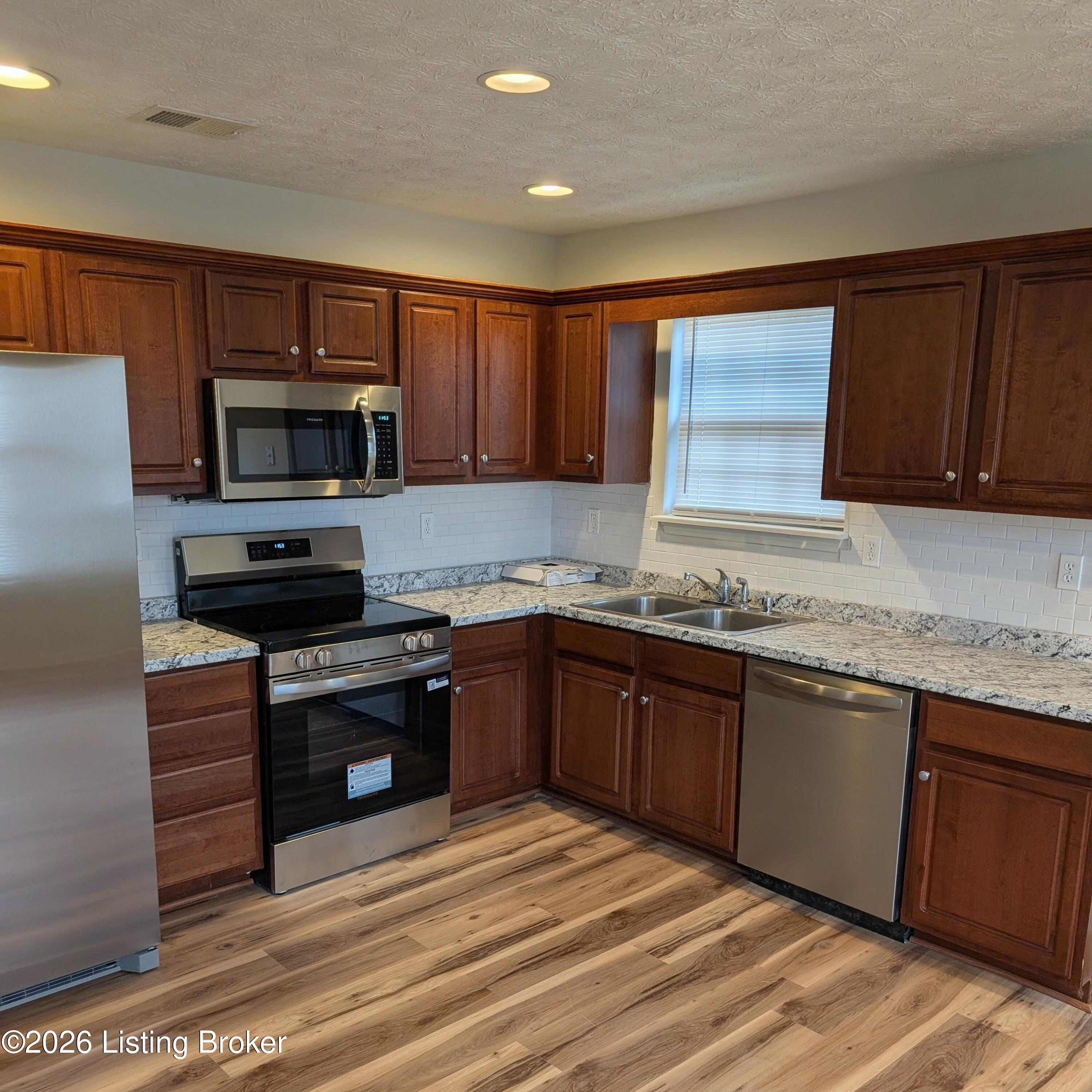 436 Hensley Road Shepherdsville, KY 40165 - Photo 6 of 23 Brand new appliances, countertops, backsplash and flooring