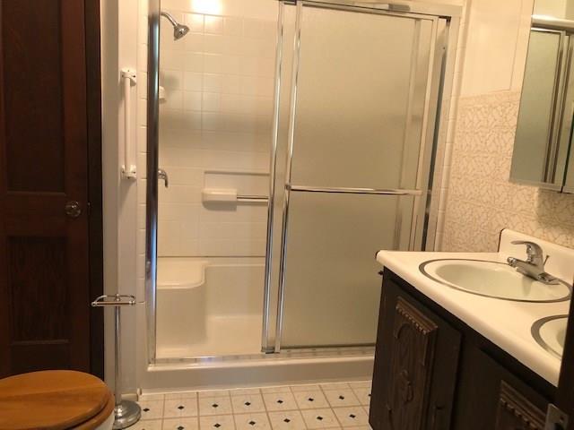 676 Sawyer Road Apollo, PA 15613 - Photo 9 of 19 FULL BATHROOM WITH DOUBLE SINKS AND SPACIOUS SHOWER