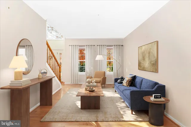 a view of an entryway with wooden floor