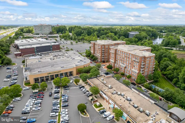 a view of a building with a yard
