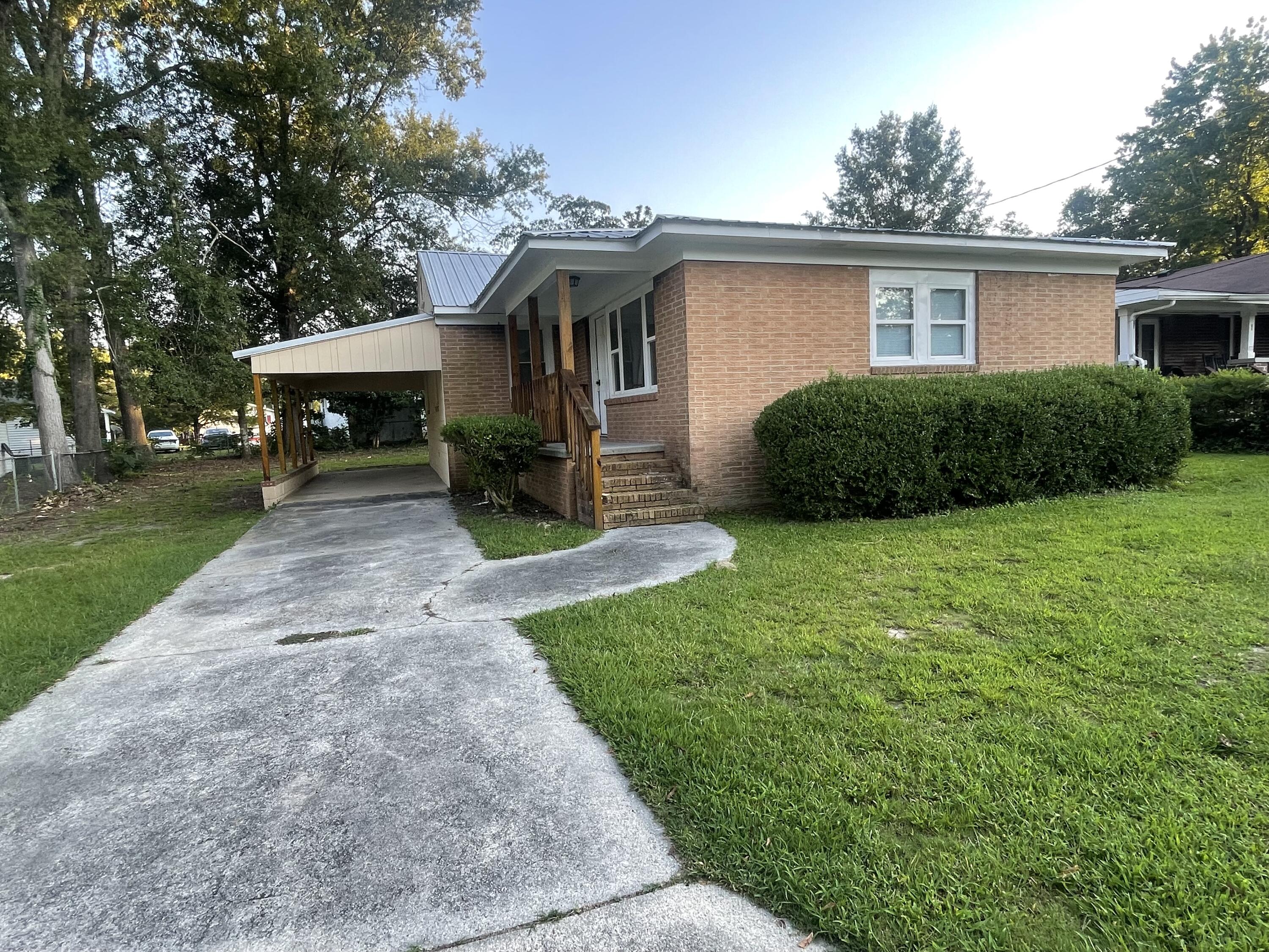 211 3rd Street Thomson, GA 30824 - Photo 2 of 18 Attached carport