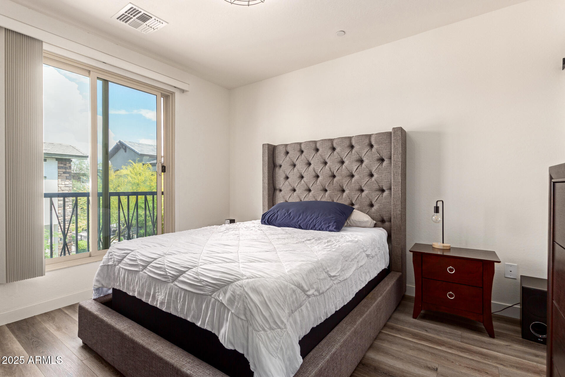 1851 East Frye Road, Unit 101 Gilbert, AZ 85295 - Photo 13 of 37 a bedroom with a large bed and a large window