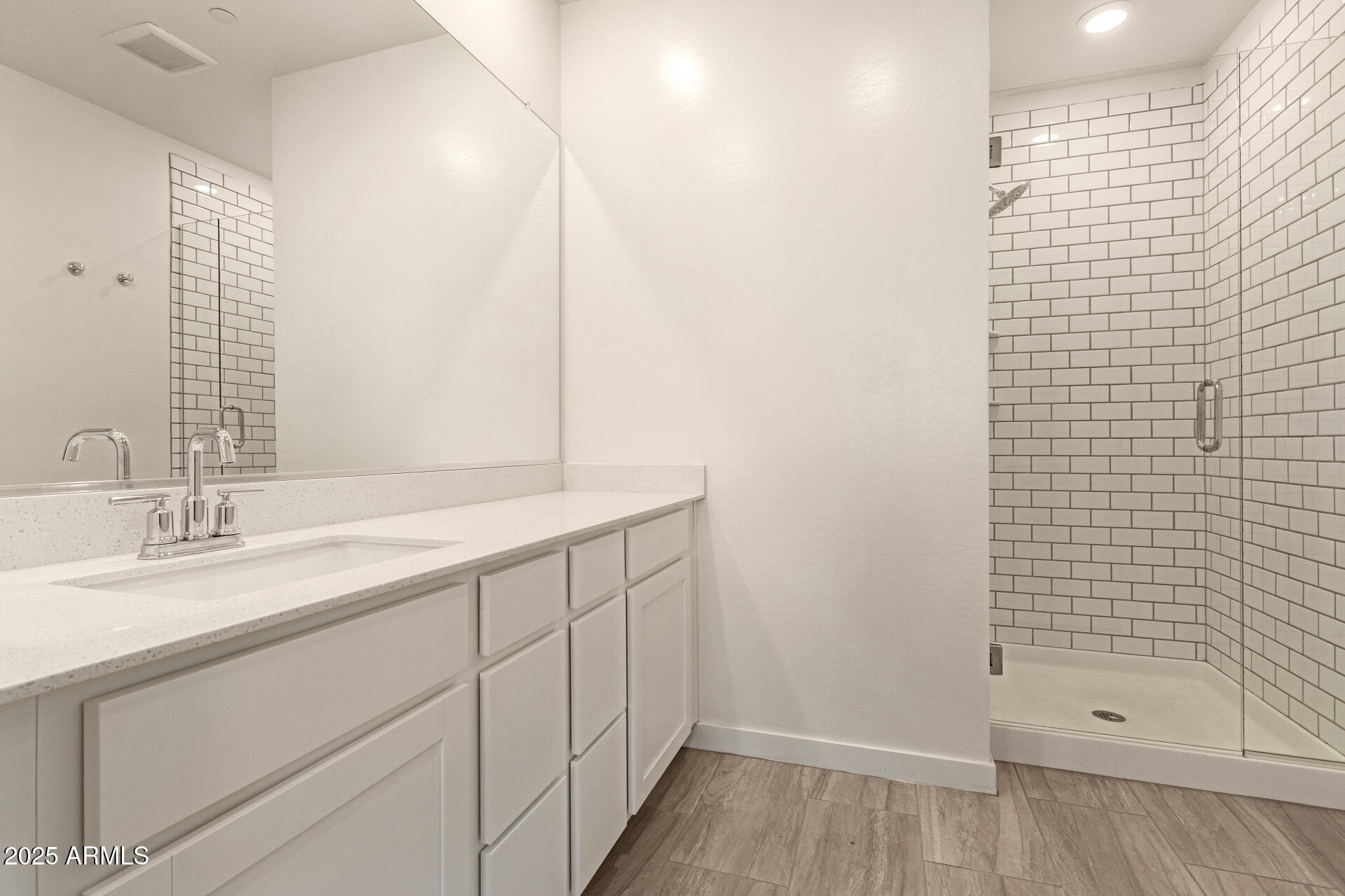 1851 East Frye Road, Unit 101 Gilbert, AZ 85295 - Photo 16 of 37 a bathroom with a sink and a shower
