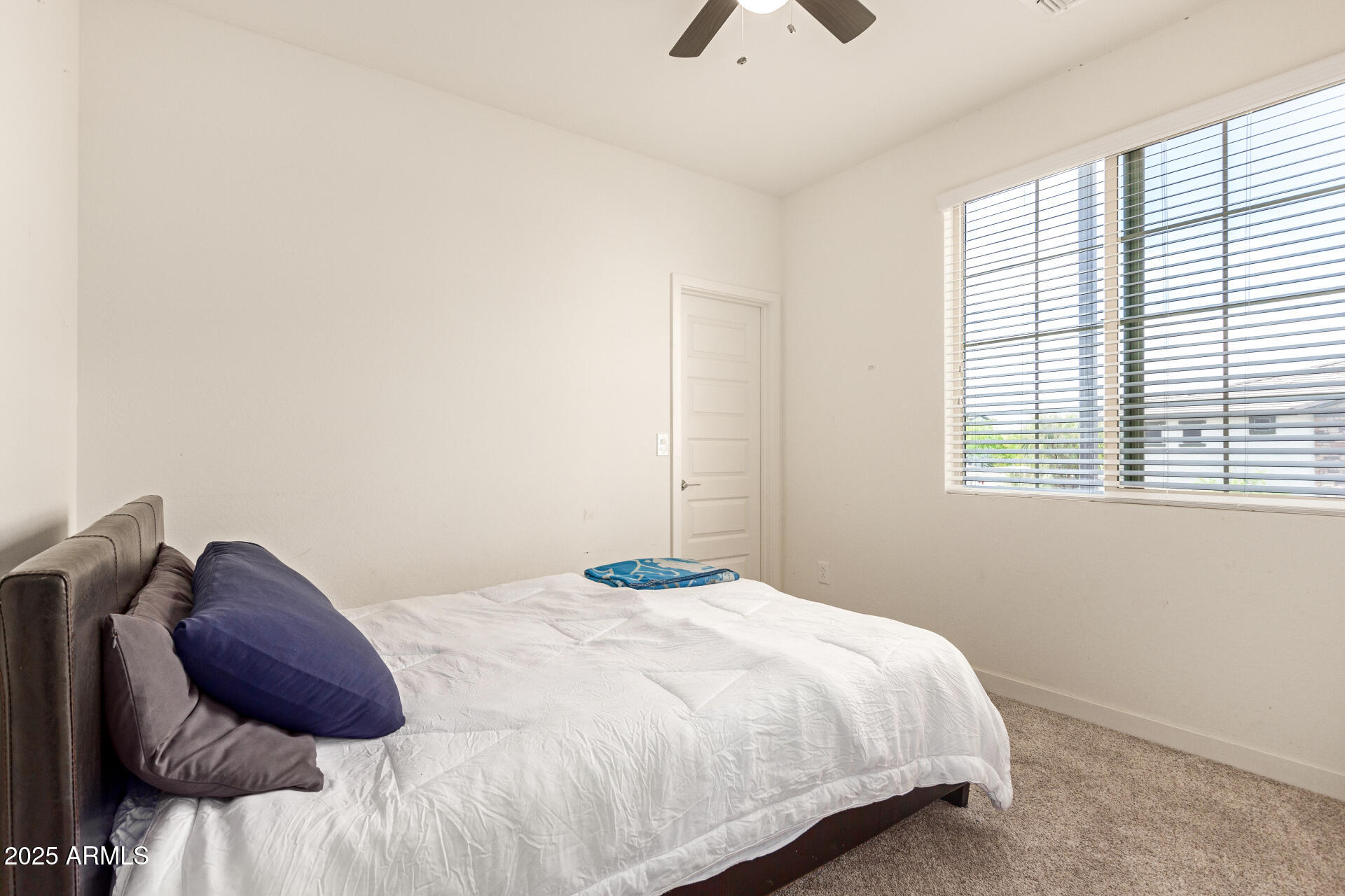 1851 East Frye Road, Unit 101 Gilbert, AZ 85295 - Photo 18 of 37 a bedroom with a bed and a window