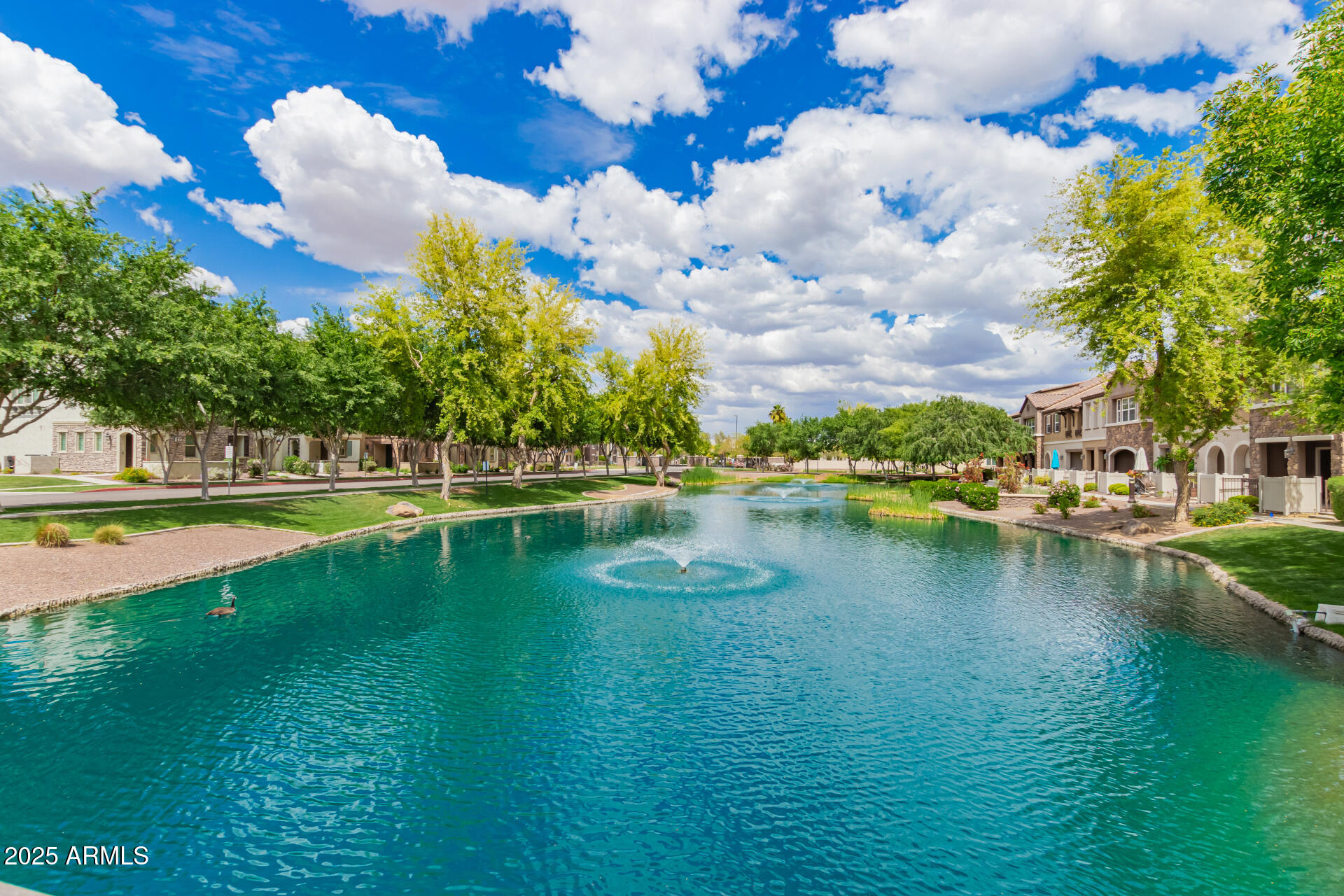 1851 East Frye Road, Unit 101 Gilbert, AZ 85295 - Photo 36 of 37 a view of a lake with houses
