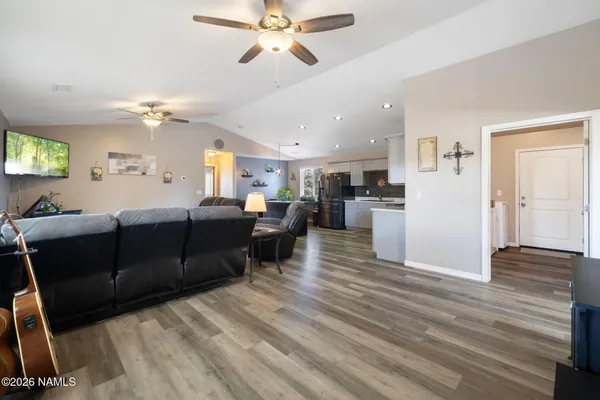 a view of a kitchen with a stove top oven