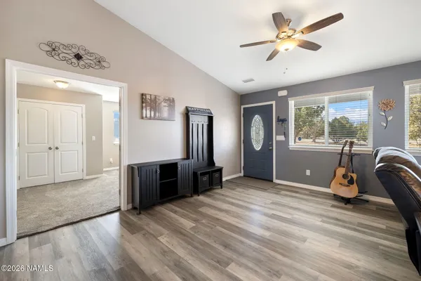 a view of a swimming pool with a yard