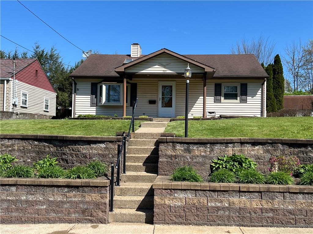 203 Carson Street Springdale, PA 15144 - Photo 1 of 43 a front view of a house with a yard