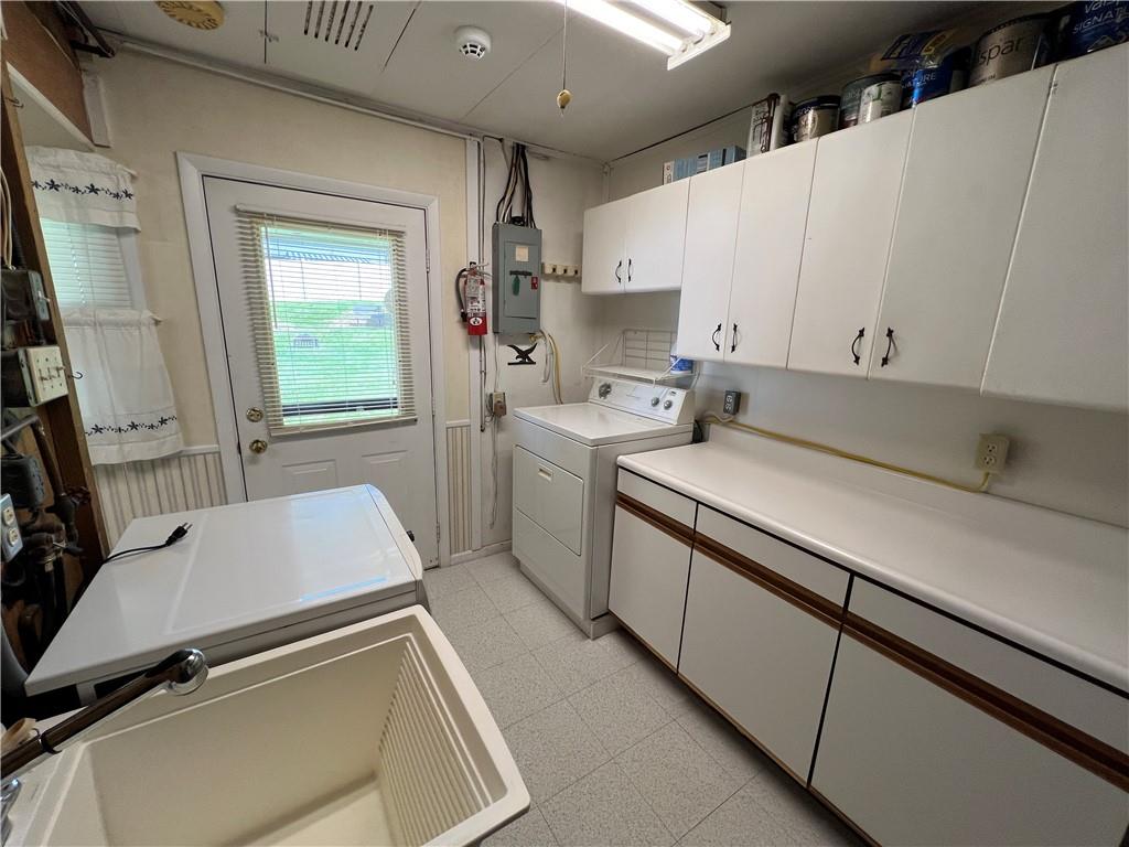 203 Carson Street Springdale, PA 15144 - Photo 12 of 43 a room with storage and utility