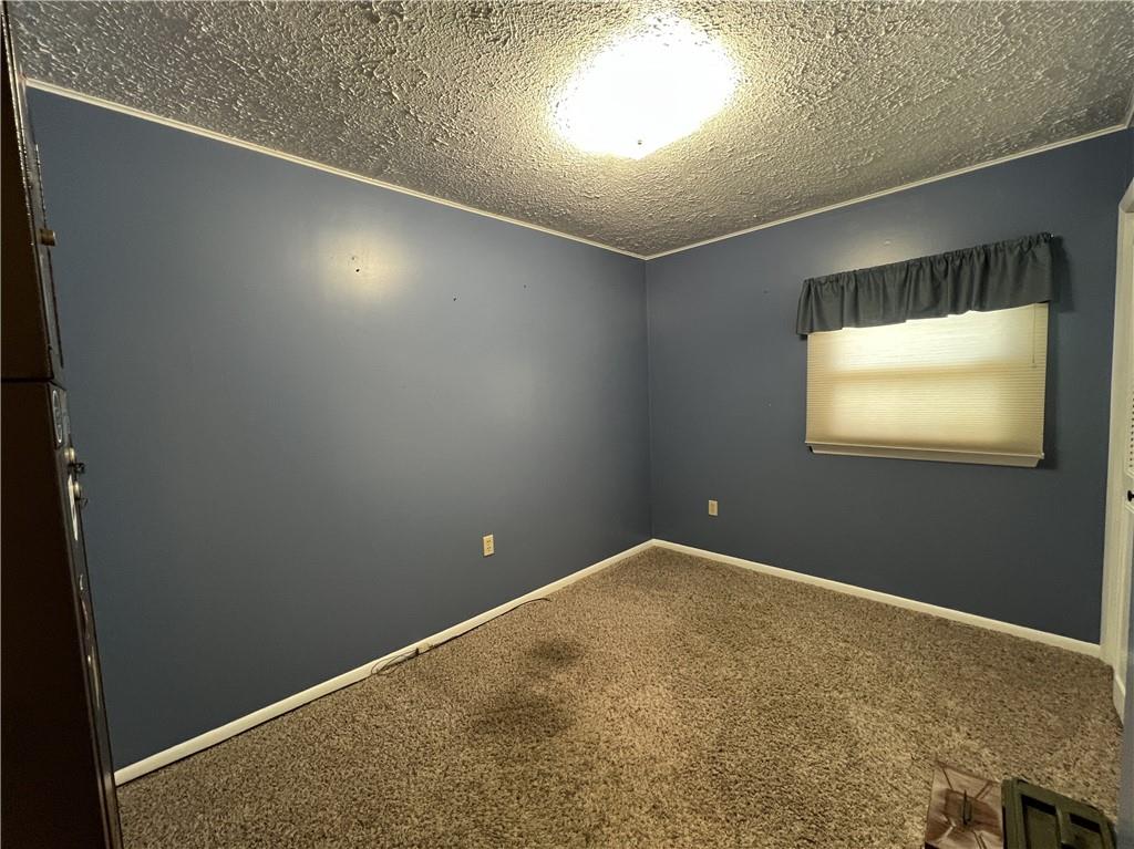 203 Carson Street Springdale, PA 15144 - Photo 18 of 43 an empty room with windows