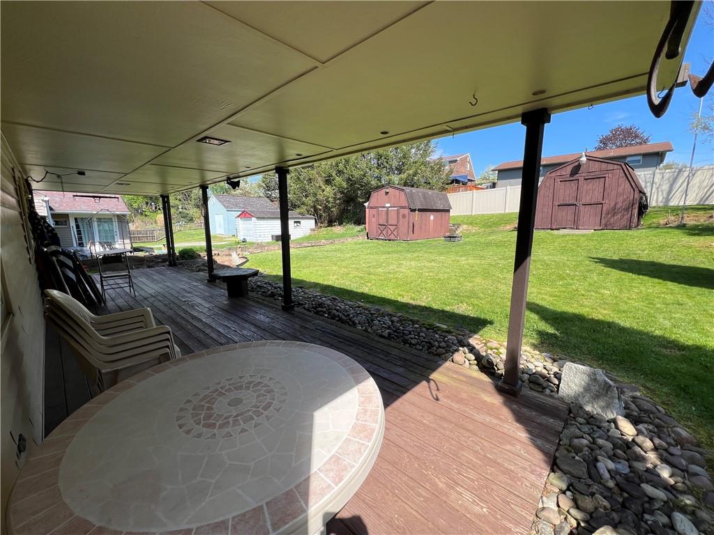 203 Carson Street Springdale, PA 15144 - Photo 23 of 43 a view of a backyard with sitting area