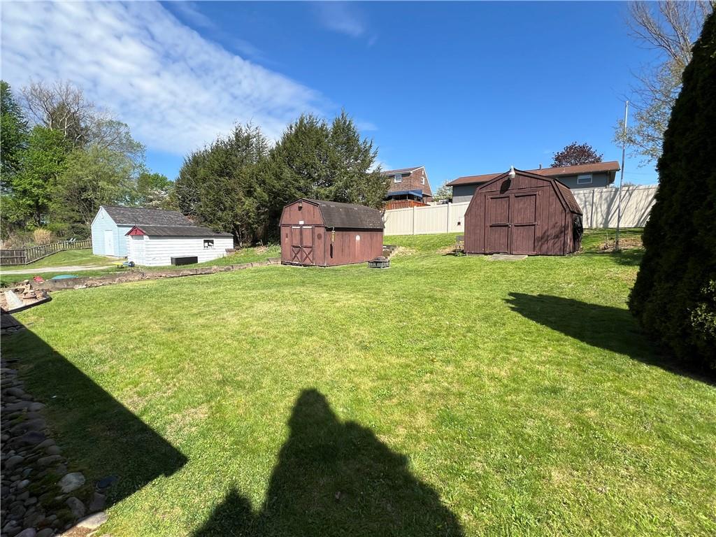 203 Carson Street Springdale, PA 15144 - Photo 24 of 43 a backyard of a house with lots of green space