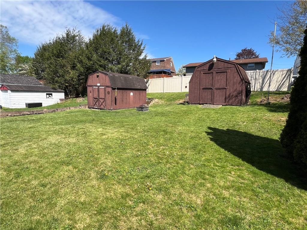 203 Carson Street Springdale, PA 15144 - Photo 25 of 43 a backyard of a house with lots of green space