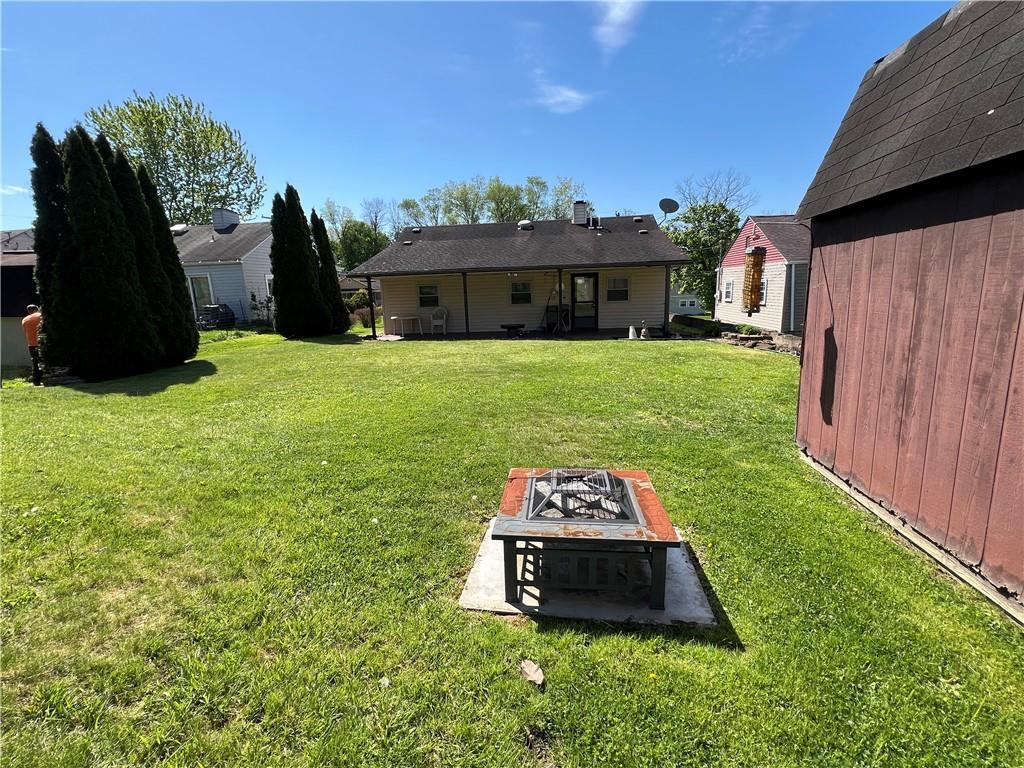 203 Carson Street Springdale, PA 15144 - Photo 28 of 43 a front view of a house with a yard