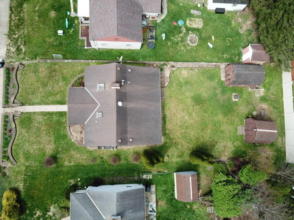 203 Carson Street Springdale, PA 15144 - Photo 39 of 43 an aerial view of a house with a garden and yard