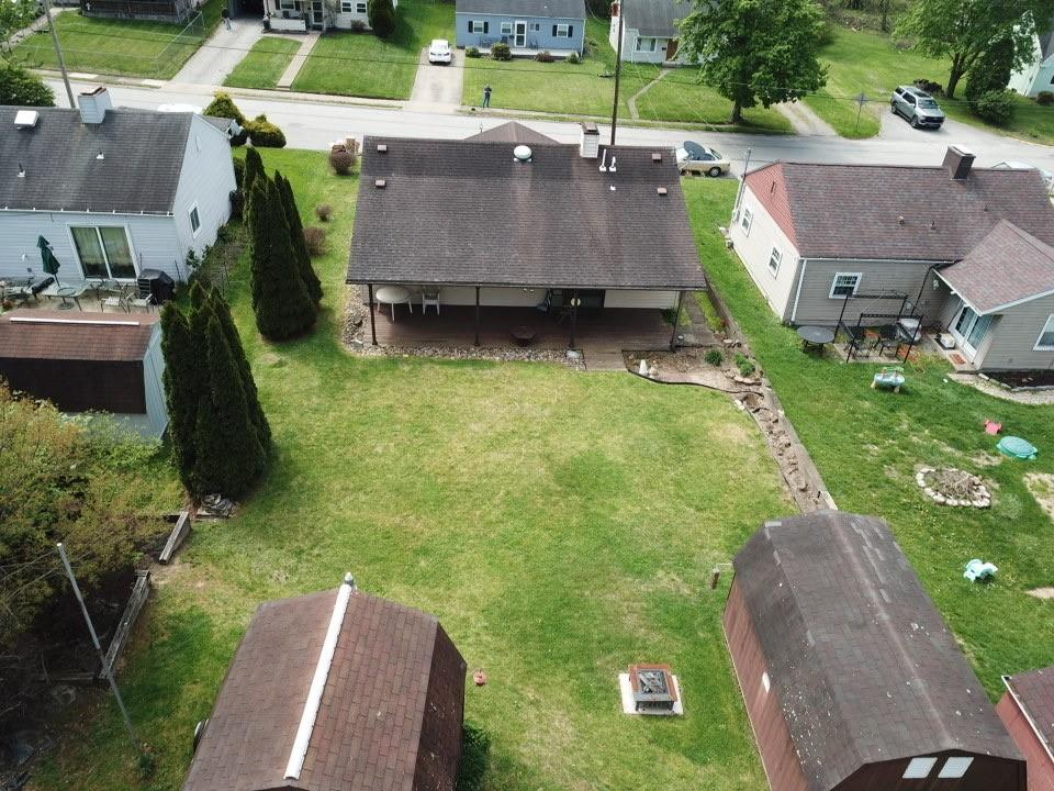 203 Carson Street Springdale, PA 15144 - Photo 40 of 43 an aerial view of a house with garden space and street view