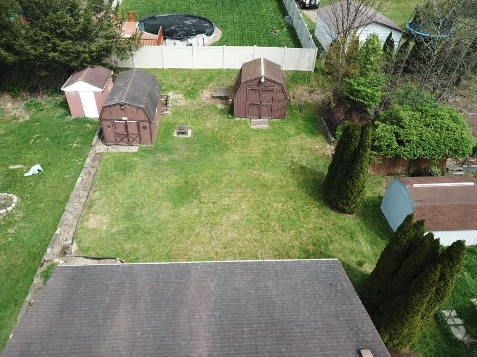 203 Carson Street Springdale, PA 15144 - Photo 41 of 43 an aerial view of residential houses with outdoor space and trees