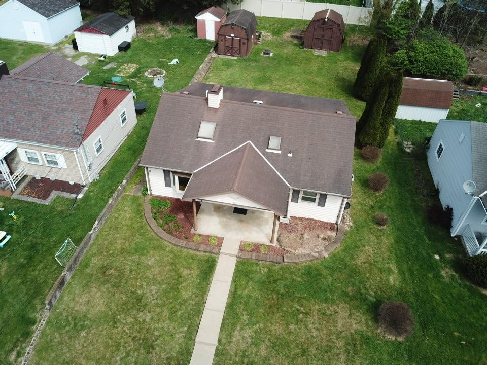 203 Carson Street Springdale, PA 15144 - Photo 42 of 43 an aerial view of a house with garden space and street view