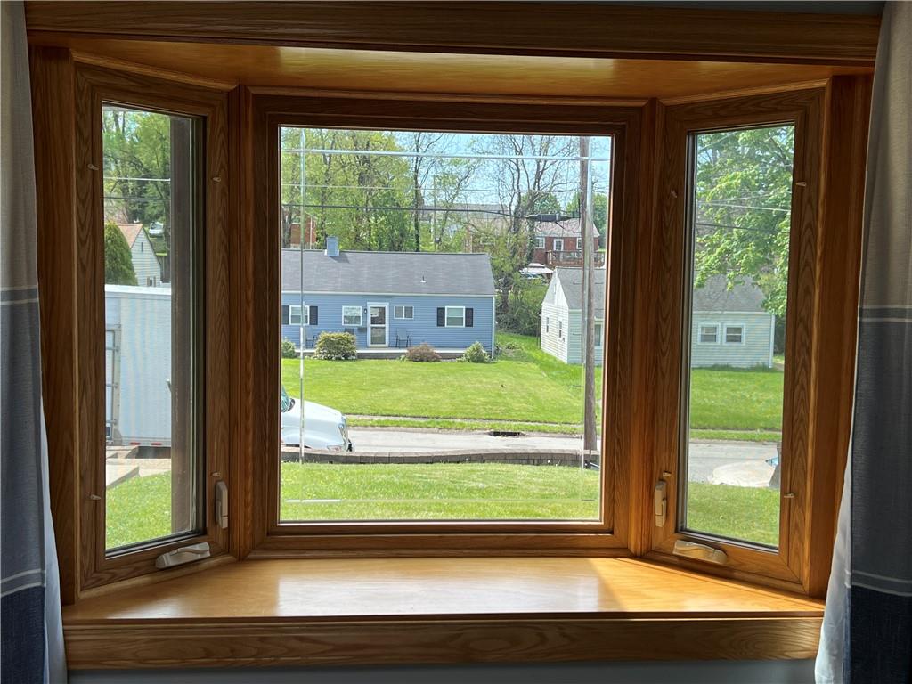 203 Carson Street Springdale, PA 15144 - Photo 7 of 43 a view of a room that has a large window