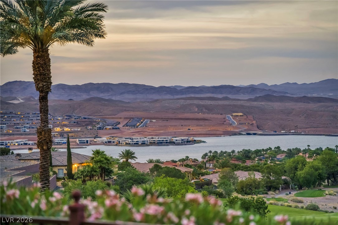 3 Rue Promenade Way Henderson, NV 89011 - Photo 26 of 26 A commanding vantage offers a spectacular panorama of the lake, distant mountains, and verdant golf course.